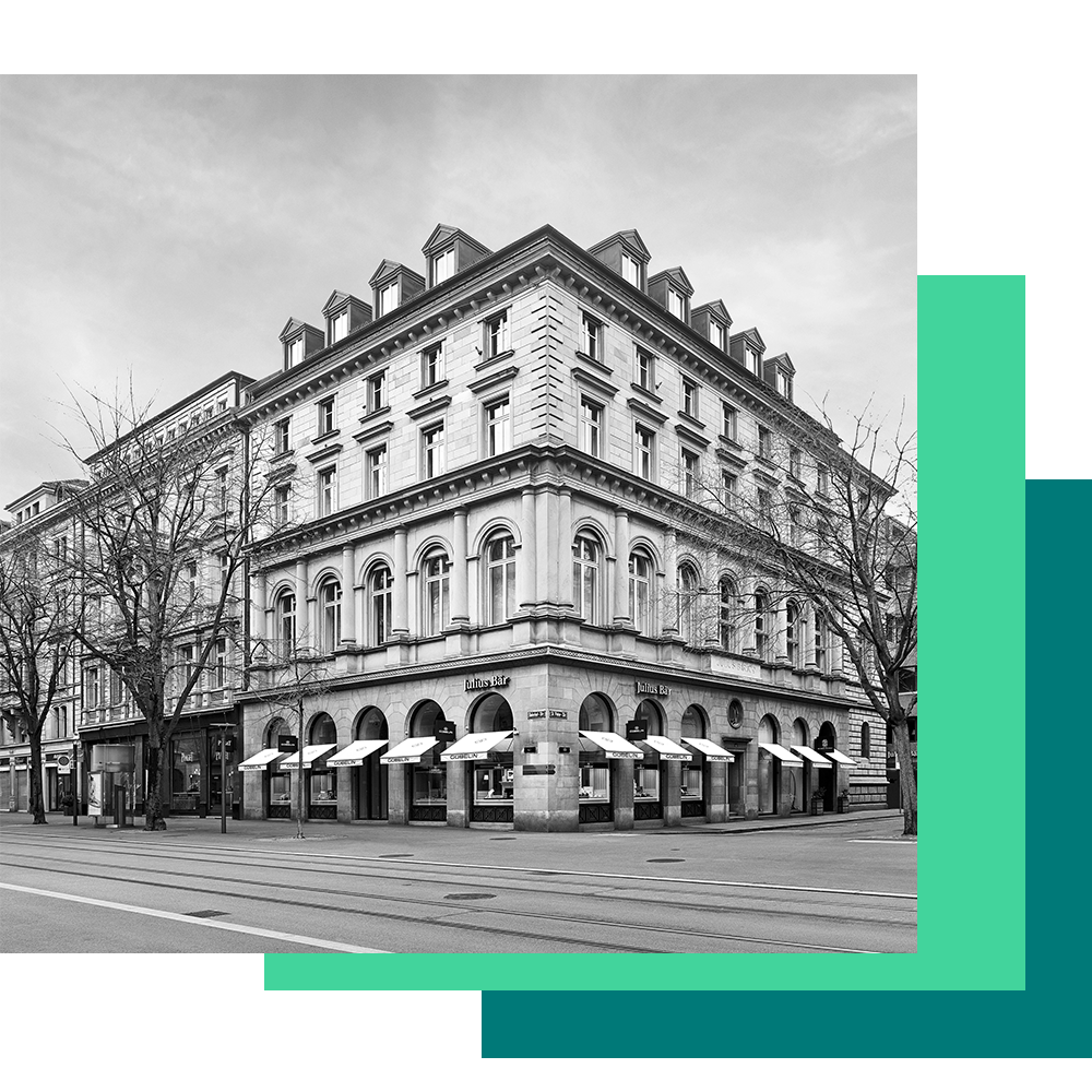 Image en noir et blanc d'un magasin Julius Baer avec vue sur la rue